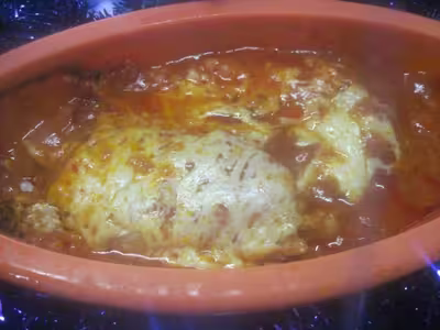 Filets de cabillaud à la sauce tomates .