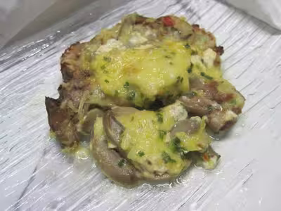 Gratin de côtelettes de porc et champignons
