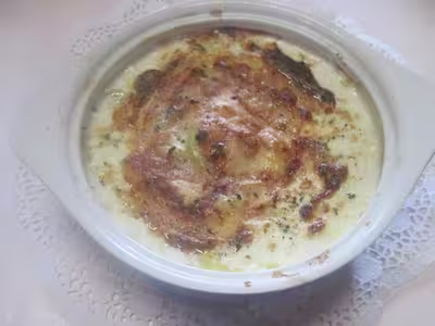 Gratin de pommes de terre au Munster aux lardons et oignons