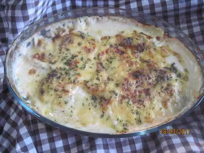 Gratin aux quenelles de poisson à la sauce béchamel