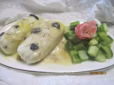 Quenelles de brochet et dés de courgettes