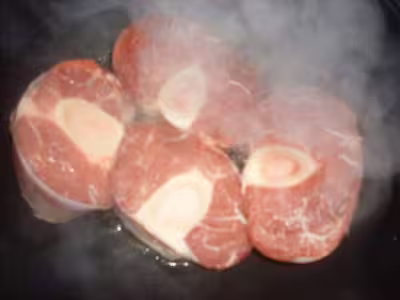 Osso-bucco de veau aux champignons, courgettes