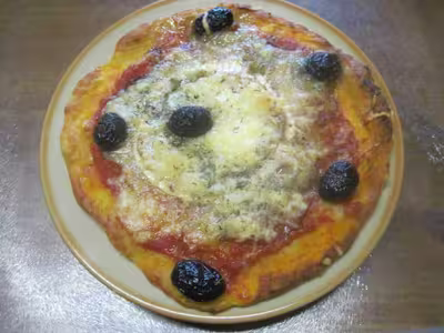 Petites pizzas au chorizo et fromage de chèvre