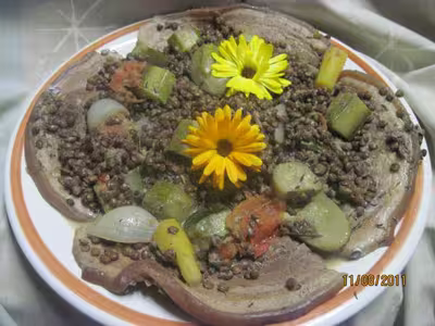 Poitrine de porc aux lentilles et crème fraîche
