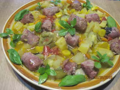 Saucisse de toulouse roulée aux légumes de saison