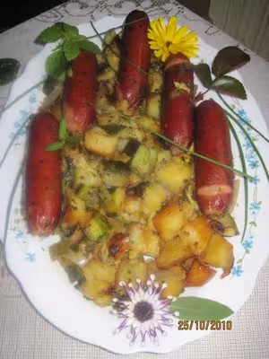 Saucisses fumées aux courgettes et pommes de terre