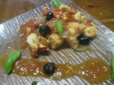 Sauté d'escalopes de dinde à la sauce tomate