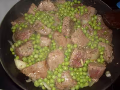 Sauté de boeuf aux petits pois du jardin