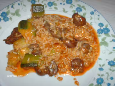 Rognons de boeuf à la nage avec riz et courgettes