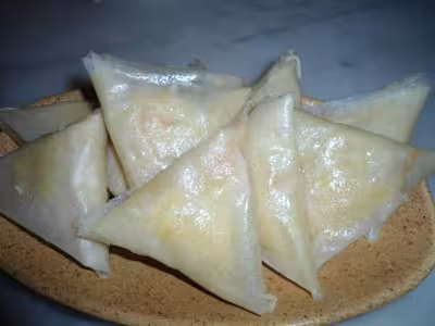 Triangles épicés au crabe impérial